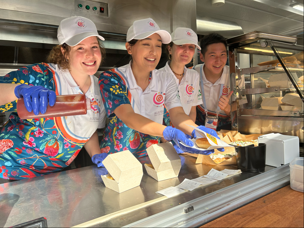 Staff at Cafe Koko selling Four'N Twenty meat pies