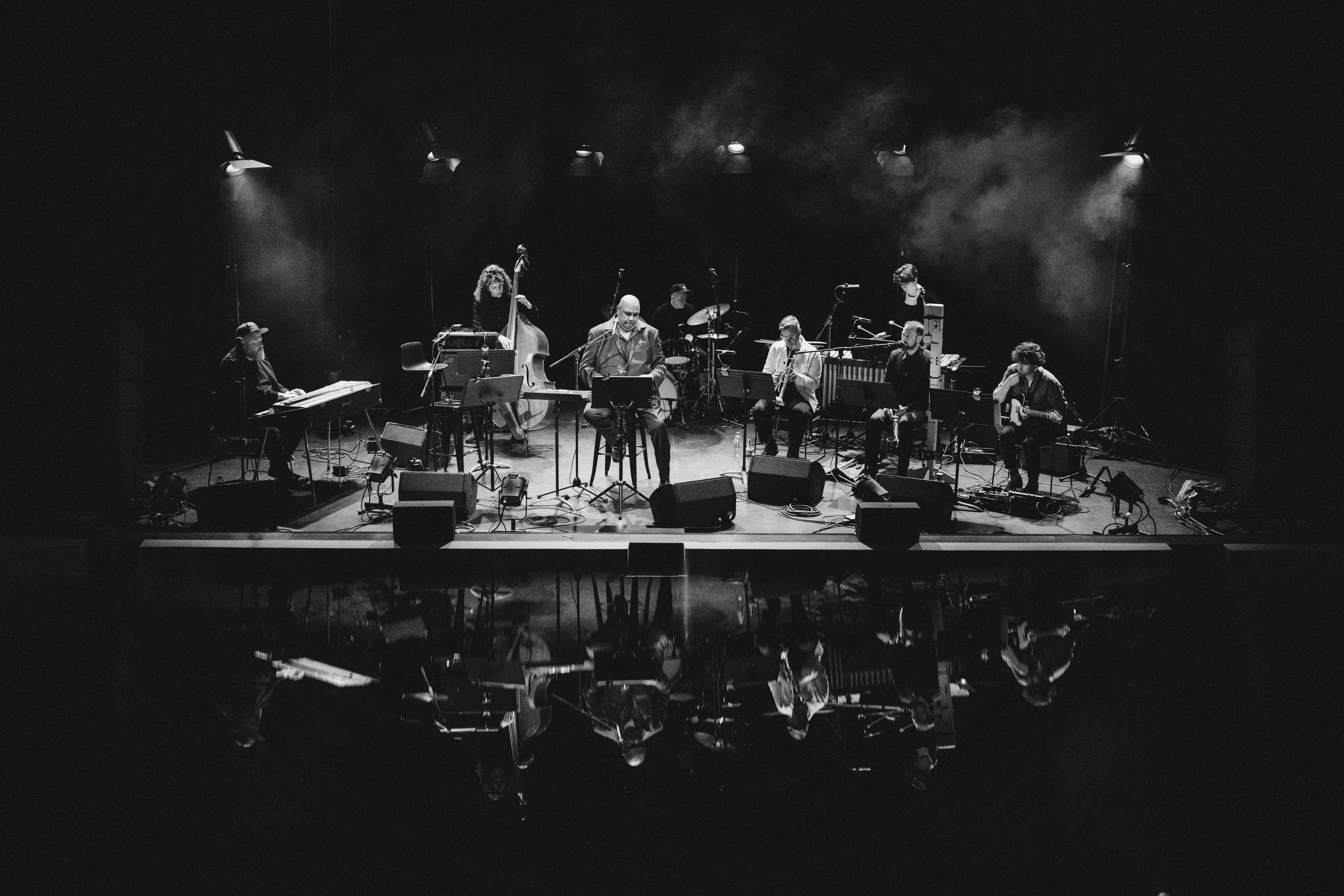 Australian Art Orchestra on stage - a black and white photograph